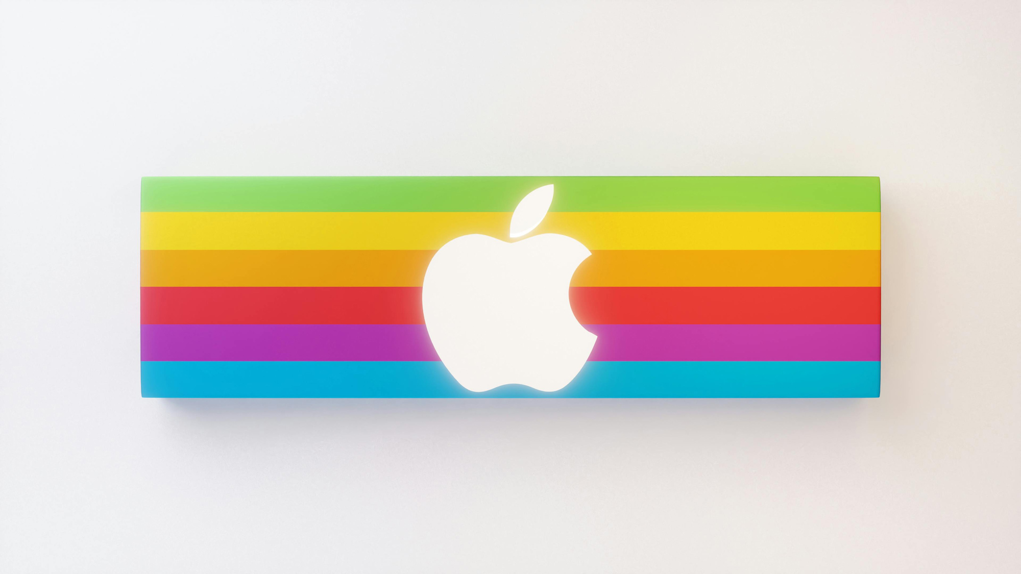 how to rebrand a business. Apple rebranding example with colorful stripes and modern white Apple logo.