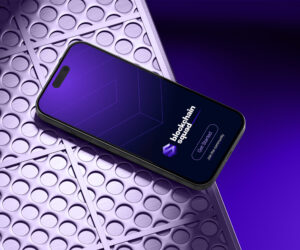 tech startup brand identity branding services for small businesses Mobile device showcasing the Blockchain Squad website homepage on a metallic lilac surface.