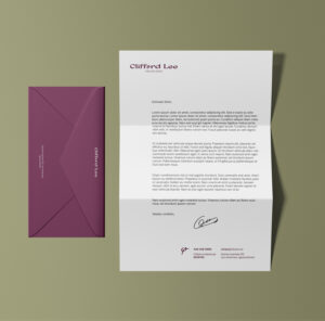 psychologist brand identity Folded letterhead and wine-colored envelope with Clifford Lee's logo on a green background.