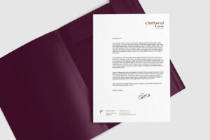 Wine-colored folder with a letterhead inside, designed for Clifford Lee's branding.