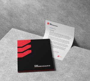 CM Armendariz folder and letterhead design on a gray background.