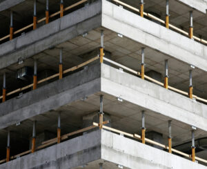 Close-up of a concrete building under construction.