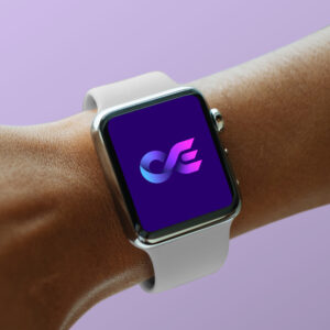 Close-up of an Apple Watch with the Commerxe logo on the screen.