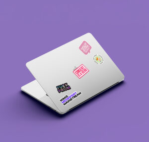 health education brand identity MacBook with Midwifery Wisdom Collective stickers on a purple background, including phrases like "Consent is a verb" and "Make midwifery mainstream."