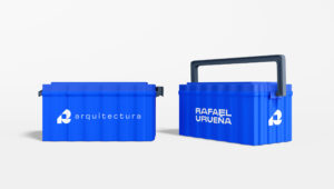 Two blue toolboxes with black handles, featuring the white Rafael Urueña logo on a white background.