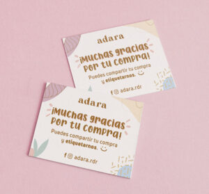 adara thank-you cards with logo and personalized message on a pink background.