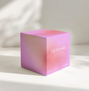 Soft pink candle box from Virtuosity Senses on a white surface with natural light.