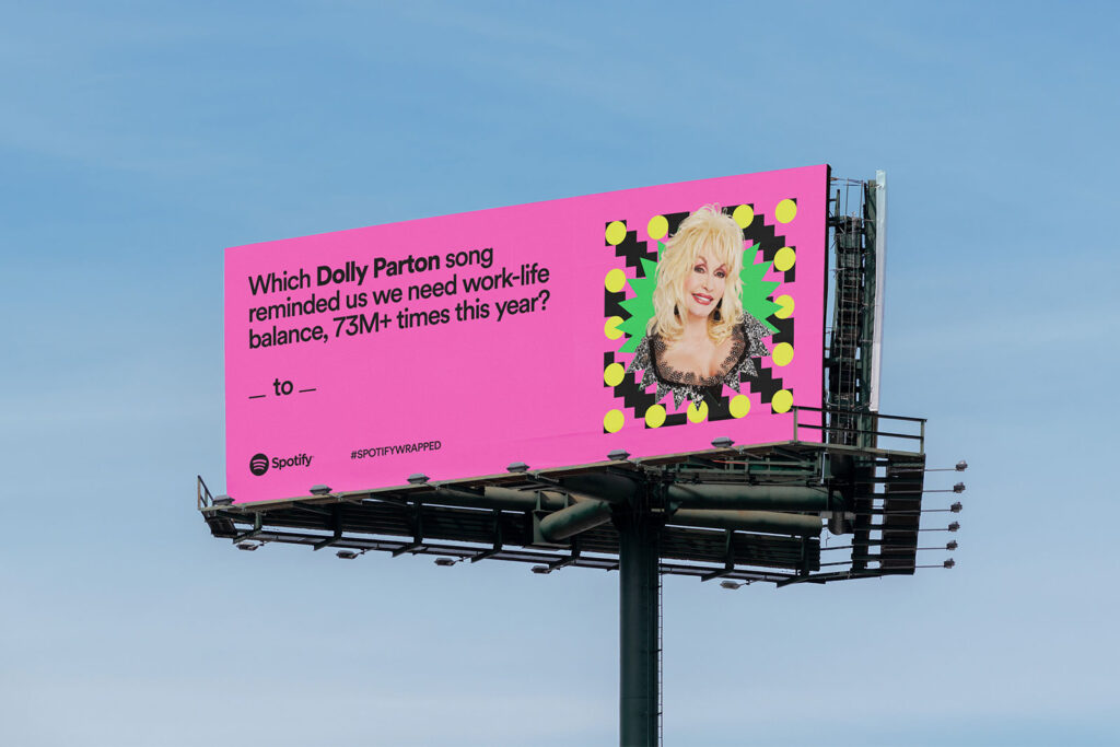 Spotify Wrapped billboard featuring Dolly Parton, communicating work-life balance with a warm brand voice tone.